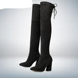 leather women shoes on knee