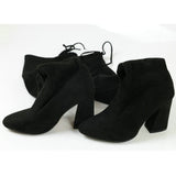 leather women shoes on knee