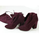 leather women shoes on knee